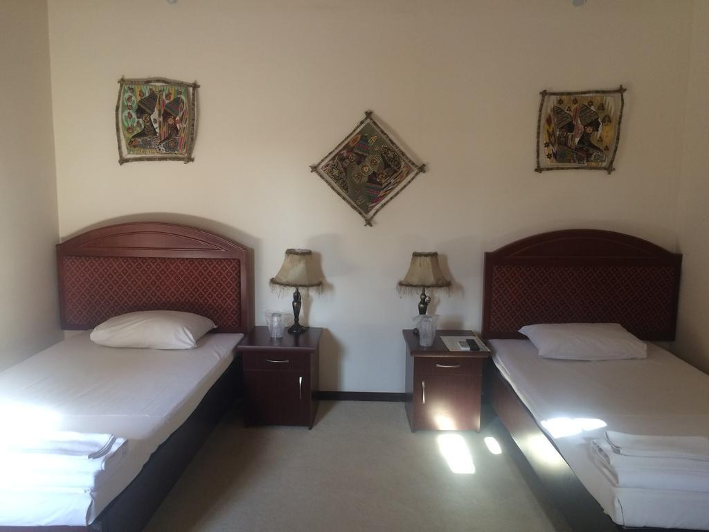 Shoxtut Hotel Бухара Екстер'єр фото